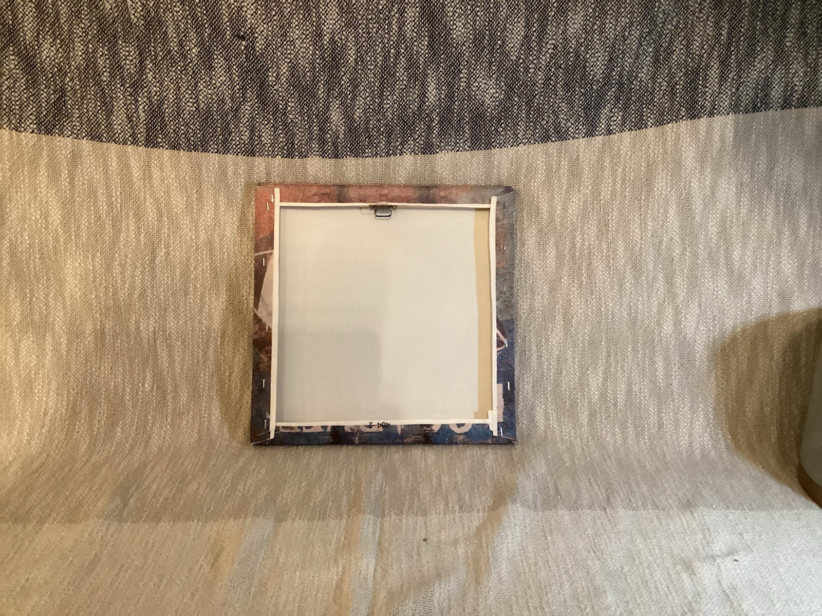 Set of 4 soft canvas wrapped sports paintings. Looks like wood. 11.5in by 11.5in