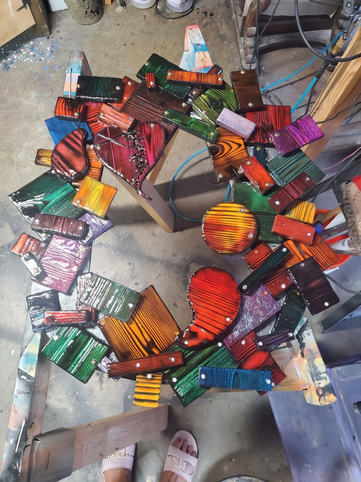 One-of-a-kind, handmade, colorful wooden wall art with mirror.