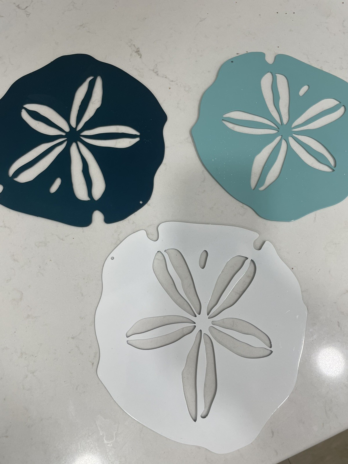 Three sand dollar beach decor. Powder coated metal for indoor or outdoor decor.