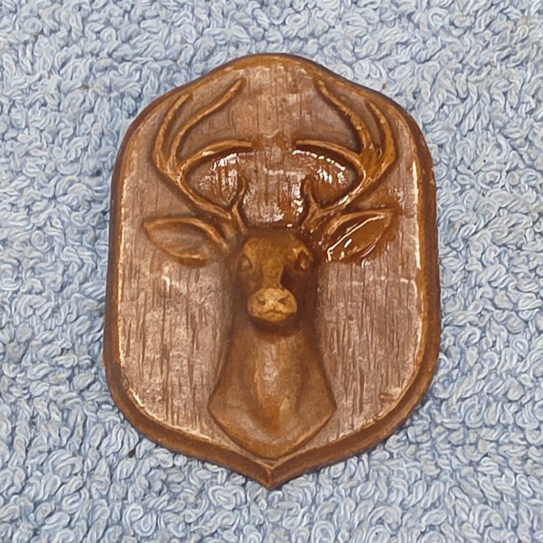 Carved Wood Deer Head Wall Plaque, Brown Shield Shape, Small 2.25 in Vertical