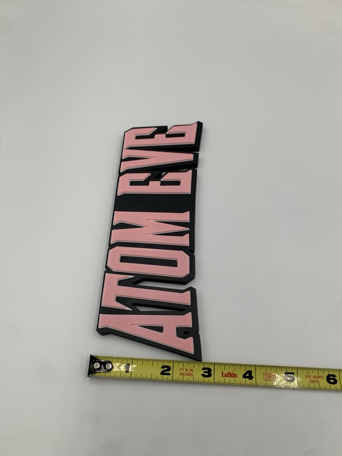 Atom Eve Sign