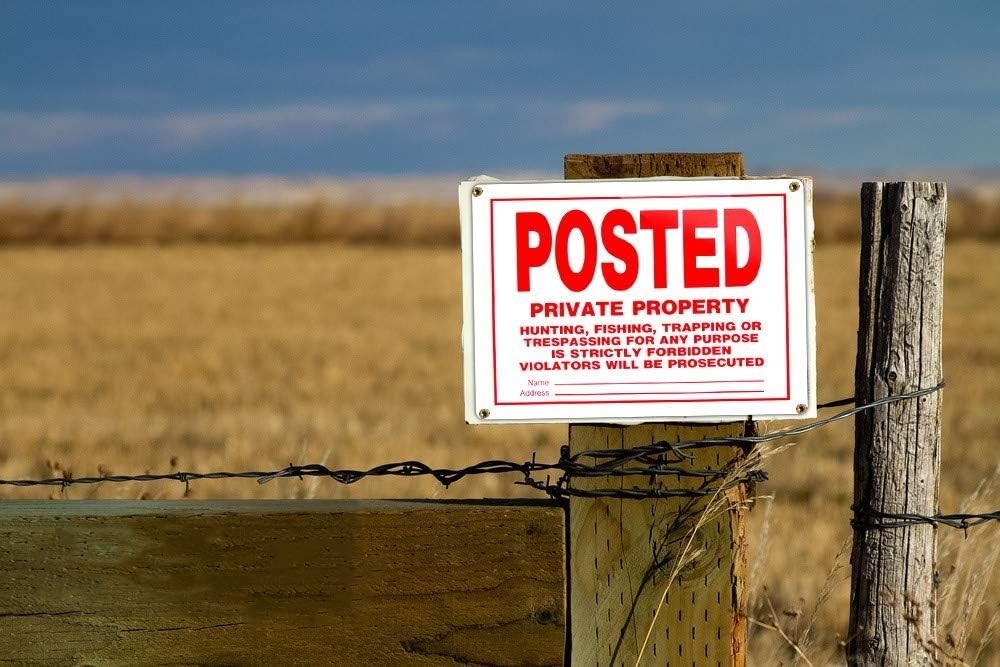 Weather-Resistant No Trespassing Sign – 14×10 Aluminum for Outdoor Use, Set of 4