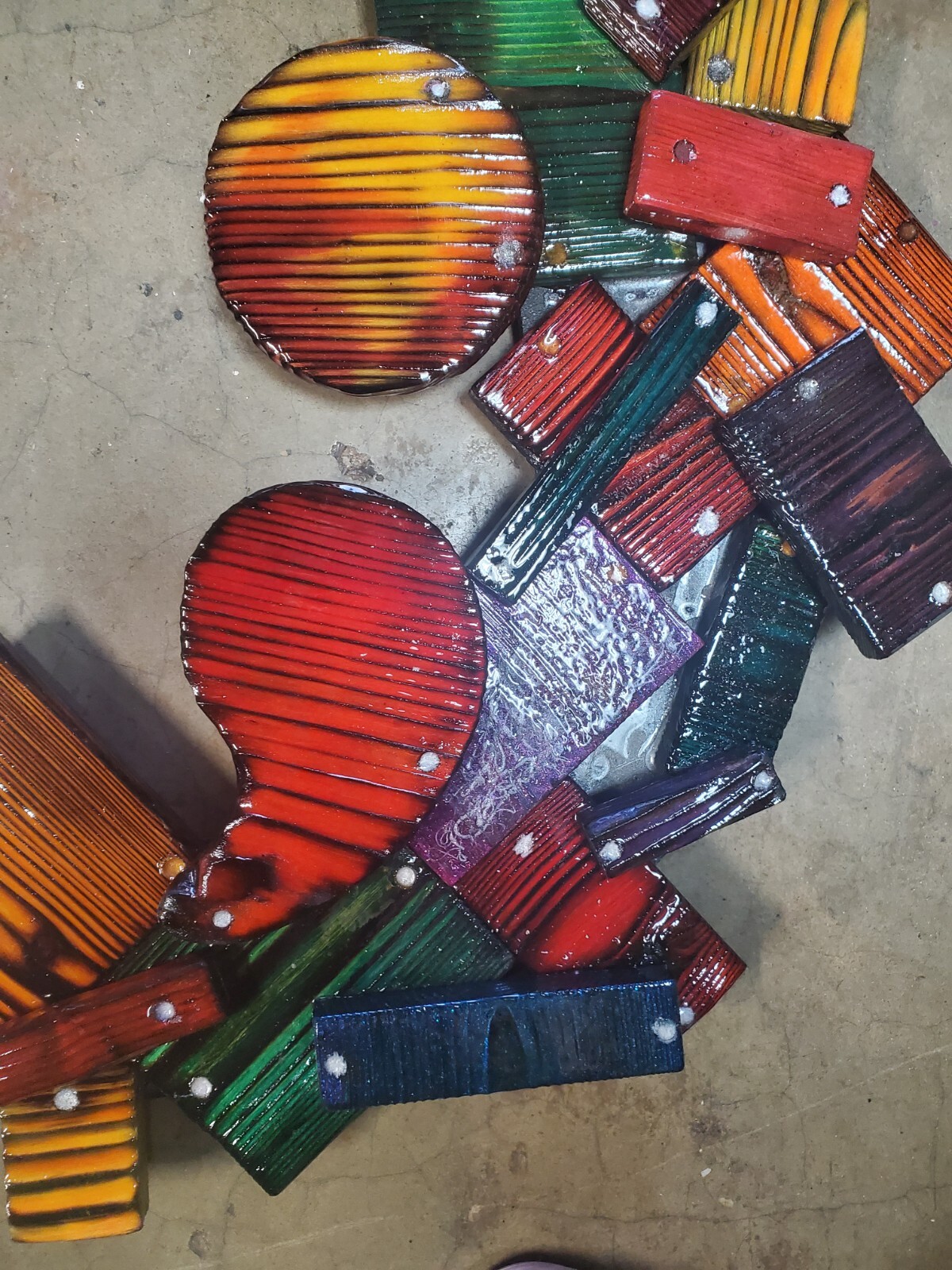 One-of-a-kind, handmade, colorful wooden wall art with mirror.