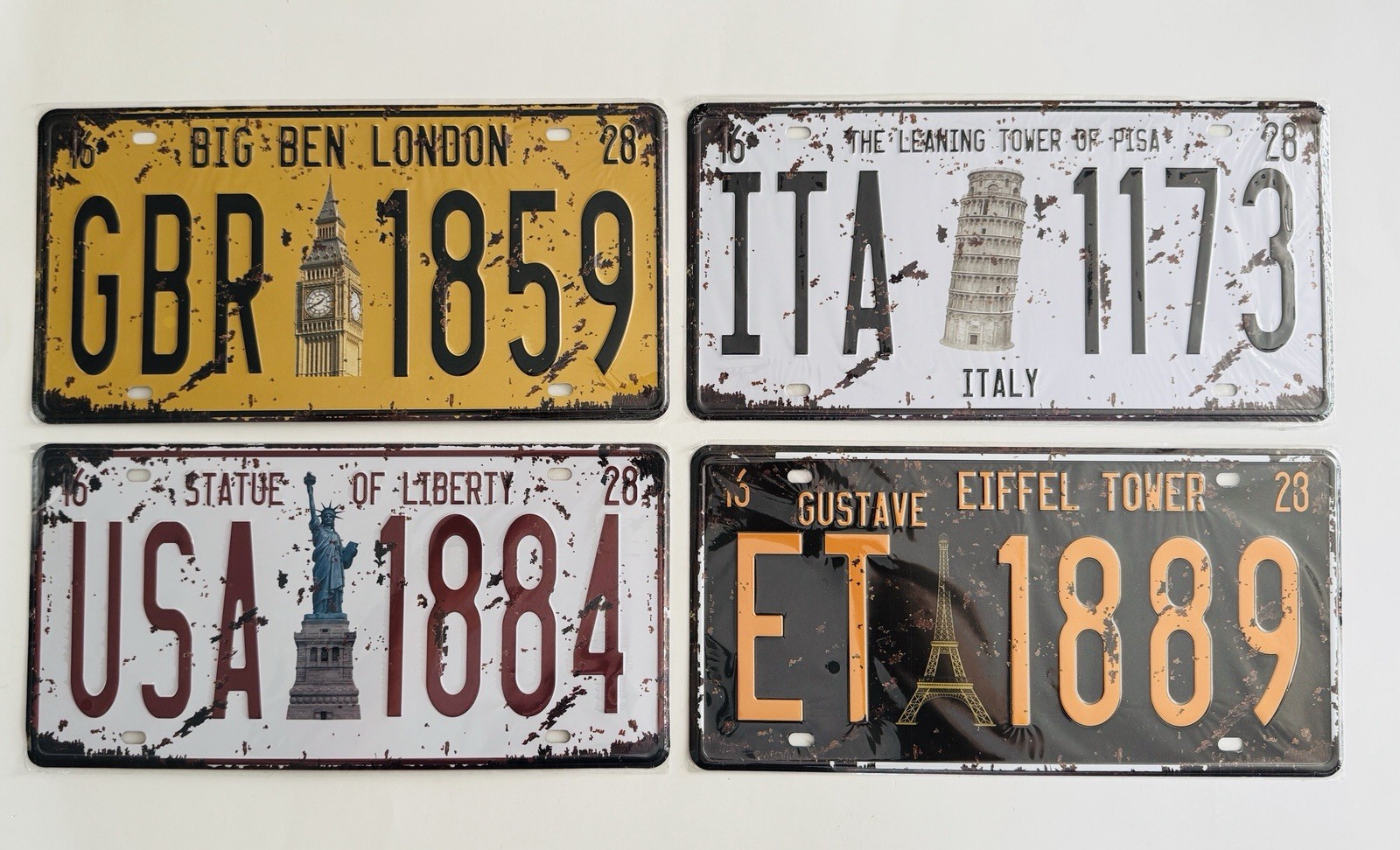 Lot of 4 Retro Style Metal Plates, Landmarks Theme, New in Plastic Wrap
