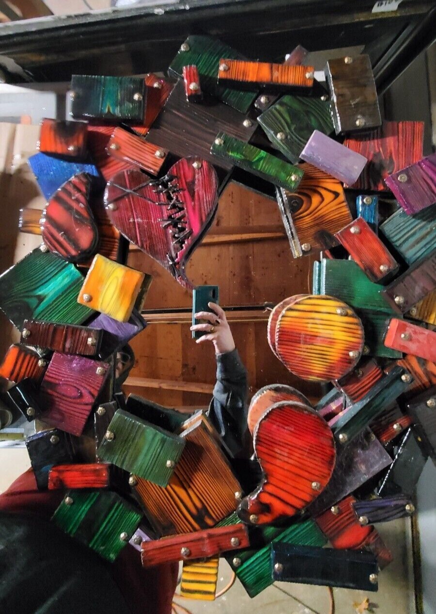 One-of-a-kind, handmade, colorful wooden wall art with mirror.