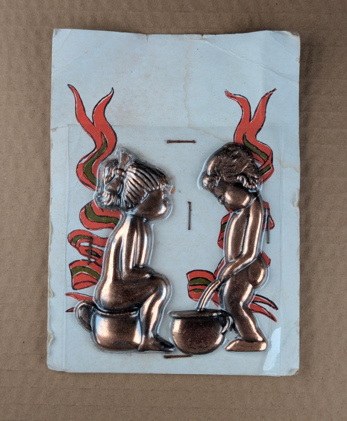 Copper (?) Girl/Boy potty plaque figures – Vintage