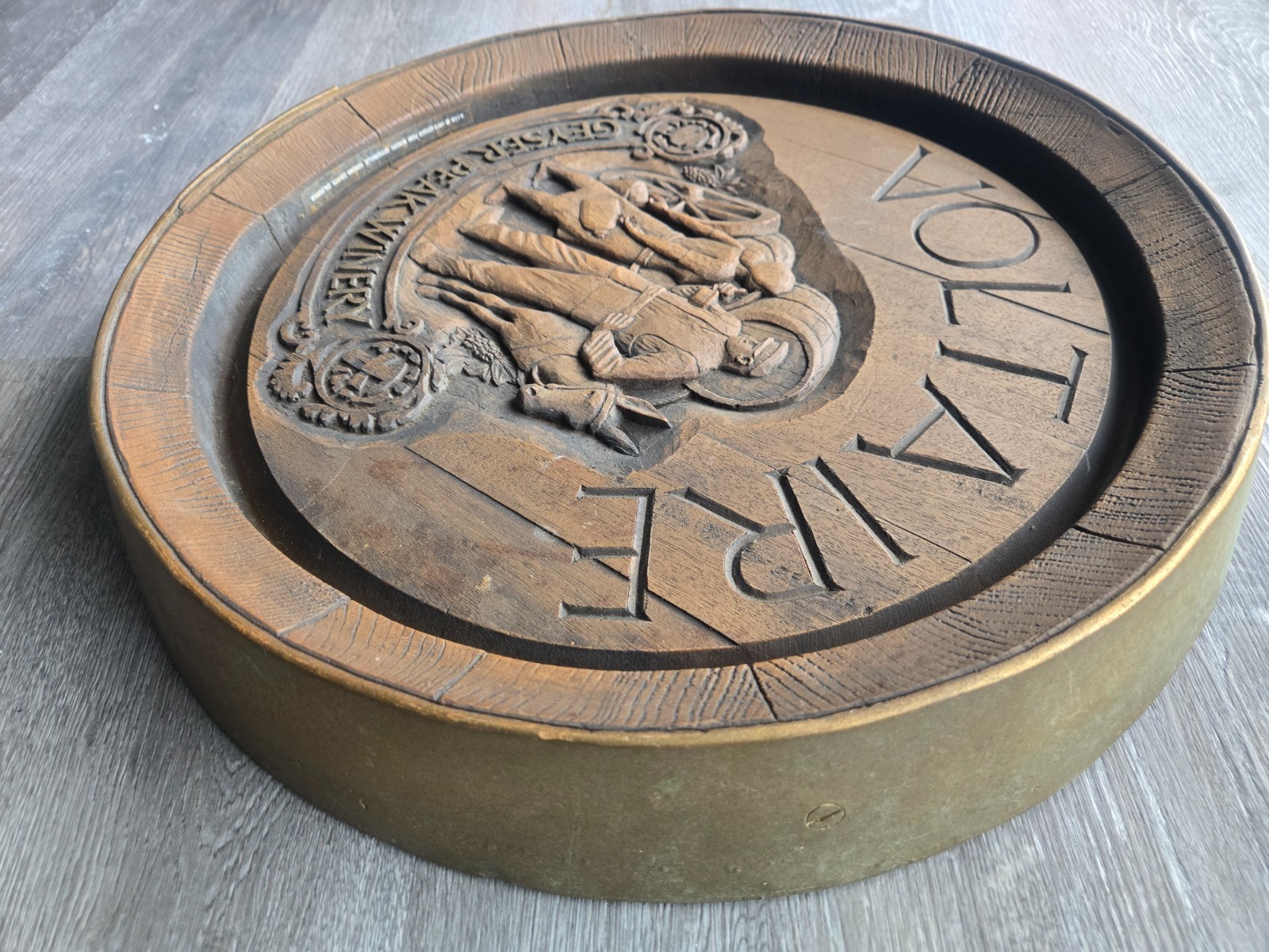 Vintage Decorative wall plaque featuring a pastoral carving