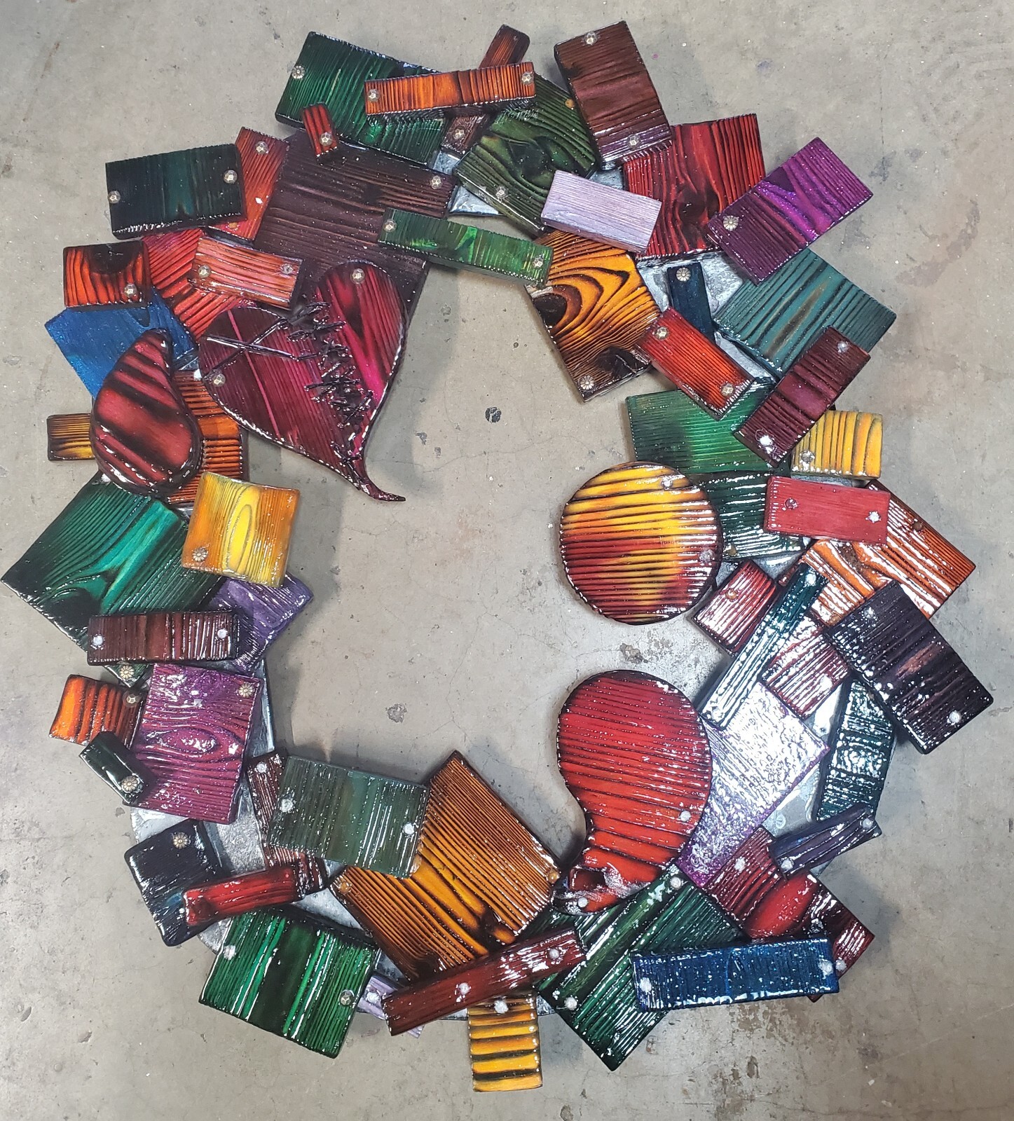 One-of-a-kind, handmade, colorful wooden wall art with mirror.