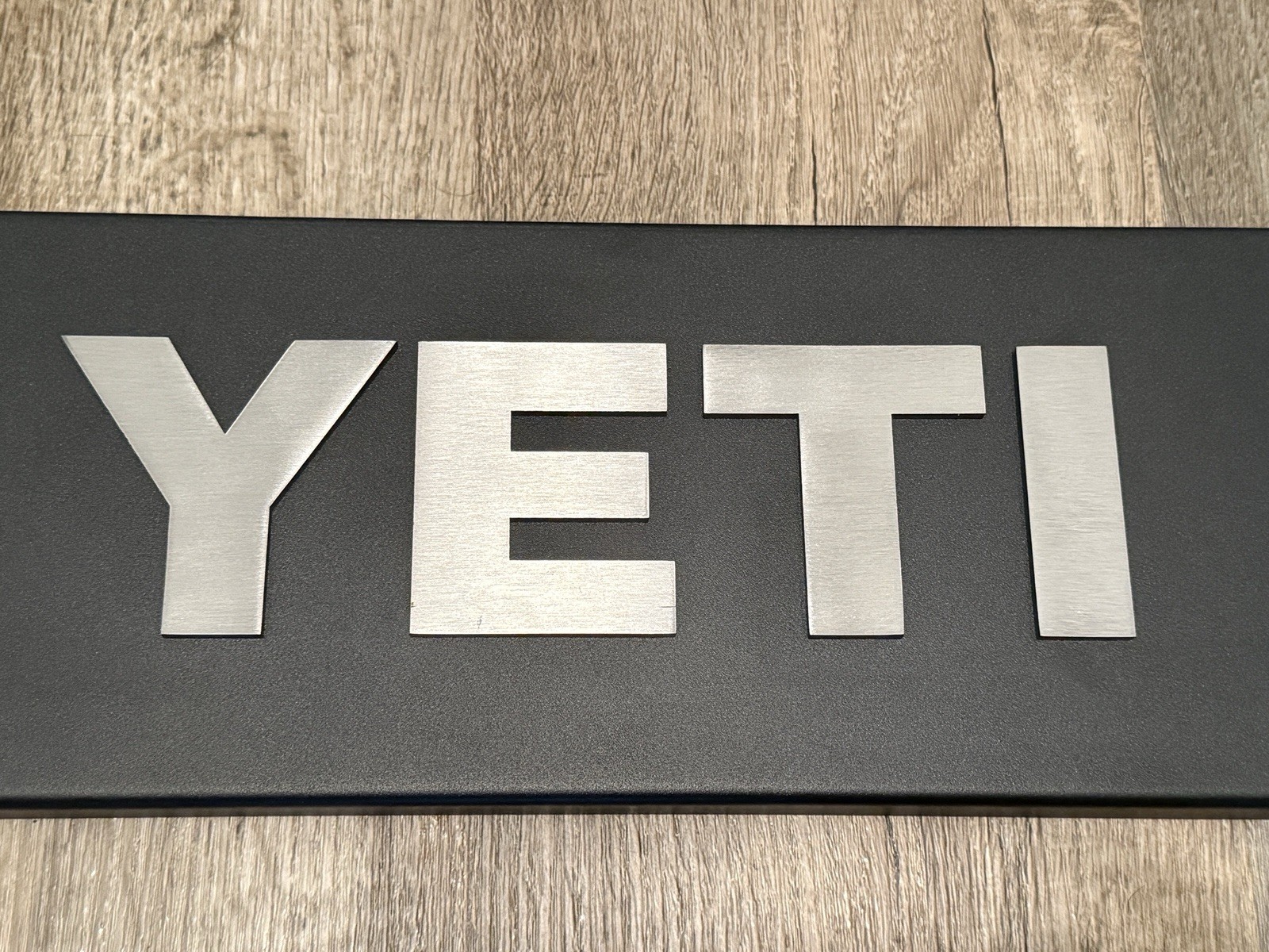 YETI Coolers Metal Advertising Dealer Display Sign 20” x 6” Black Silver