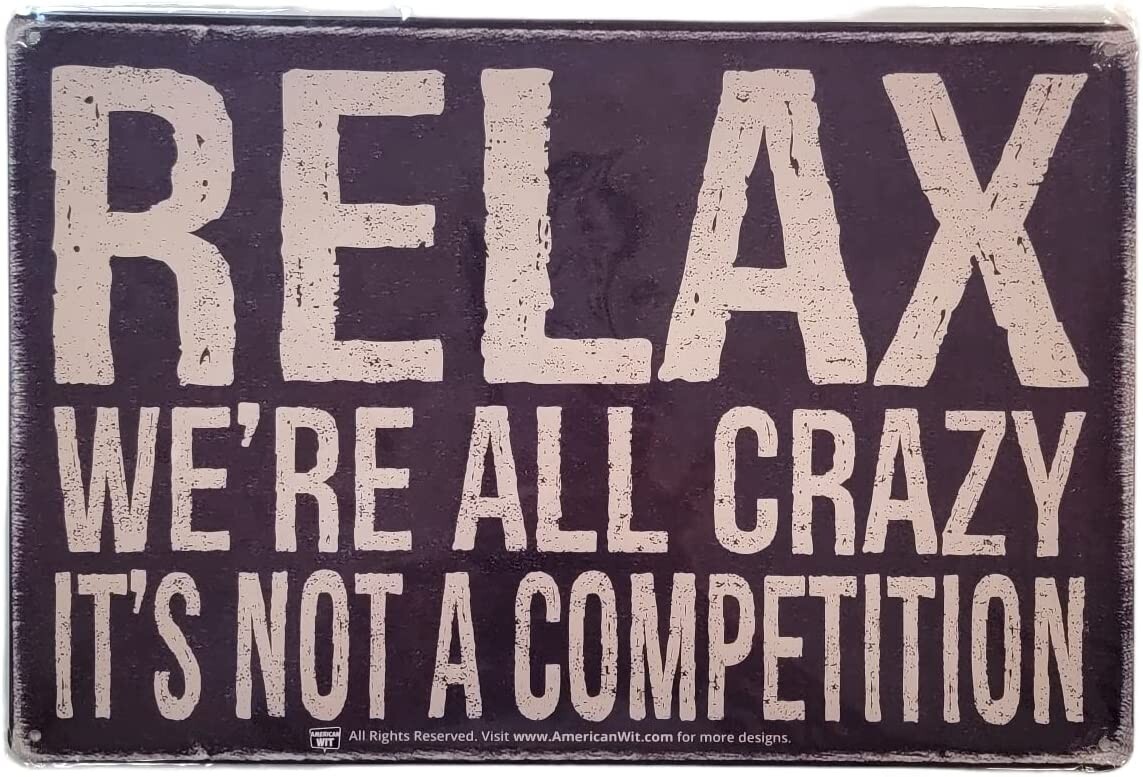 AMERICAN WIT 8″ x 12″ Tin Sign (Relax We’re All Crazy, It’s not A Competition)