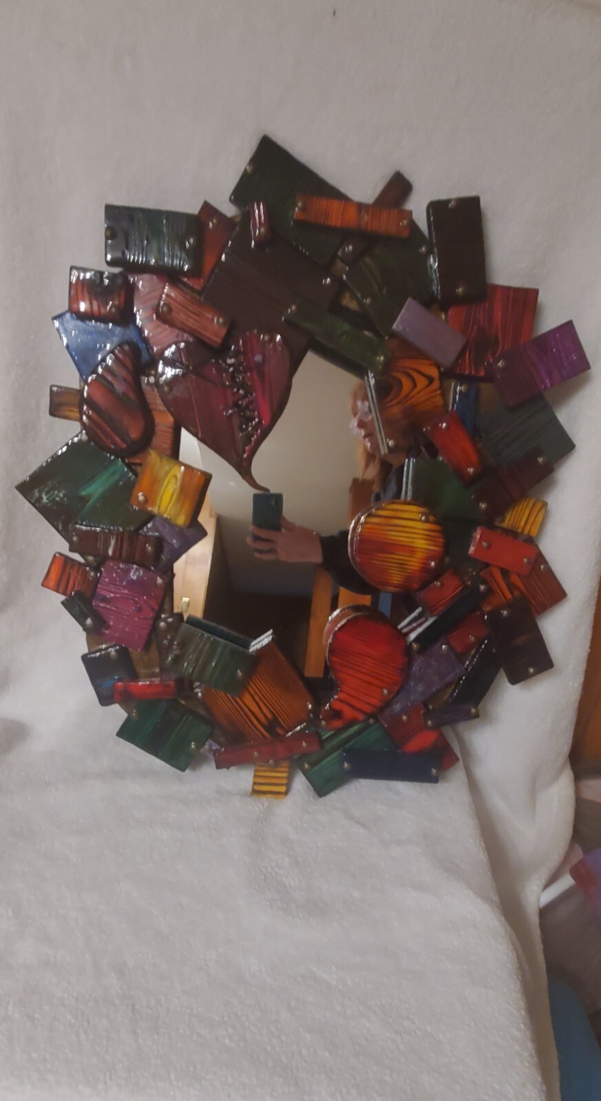 One-of-a-kind, handmade, colorful wooden wall art with mirror.