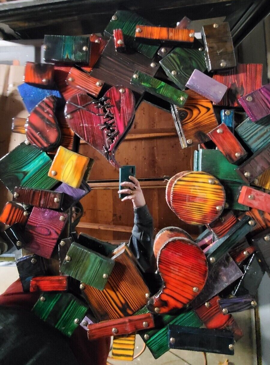 One-of-a-kind, handmade, colorful wooden wall art with mirror.